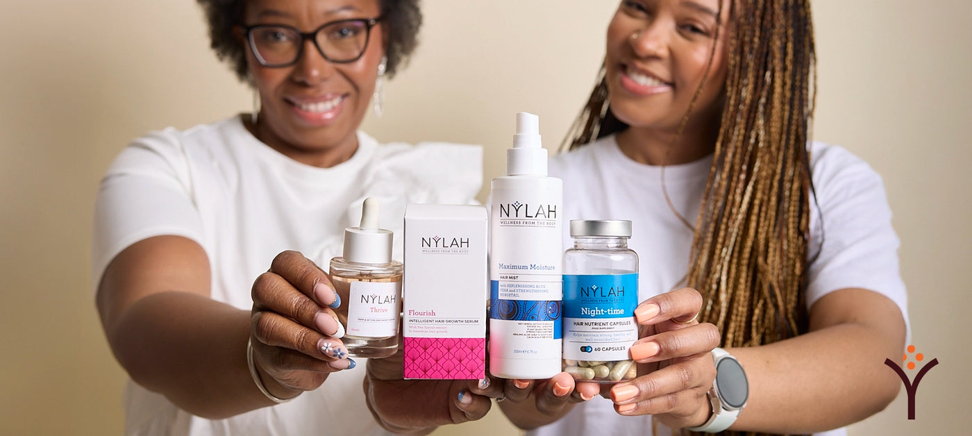 Two Models holding Nylah's Naturals Products