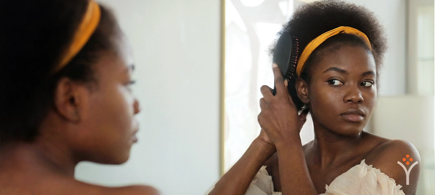 Woman stressed while working on laptop